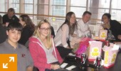 Enjoying pizza and popcorn at a team event