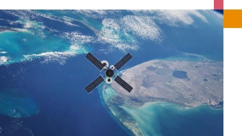 A satellite in space travels over bright blue water and
                          sparsely populated islands