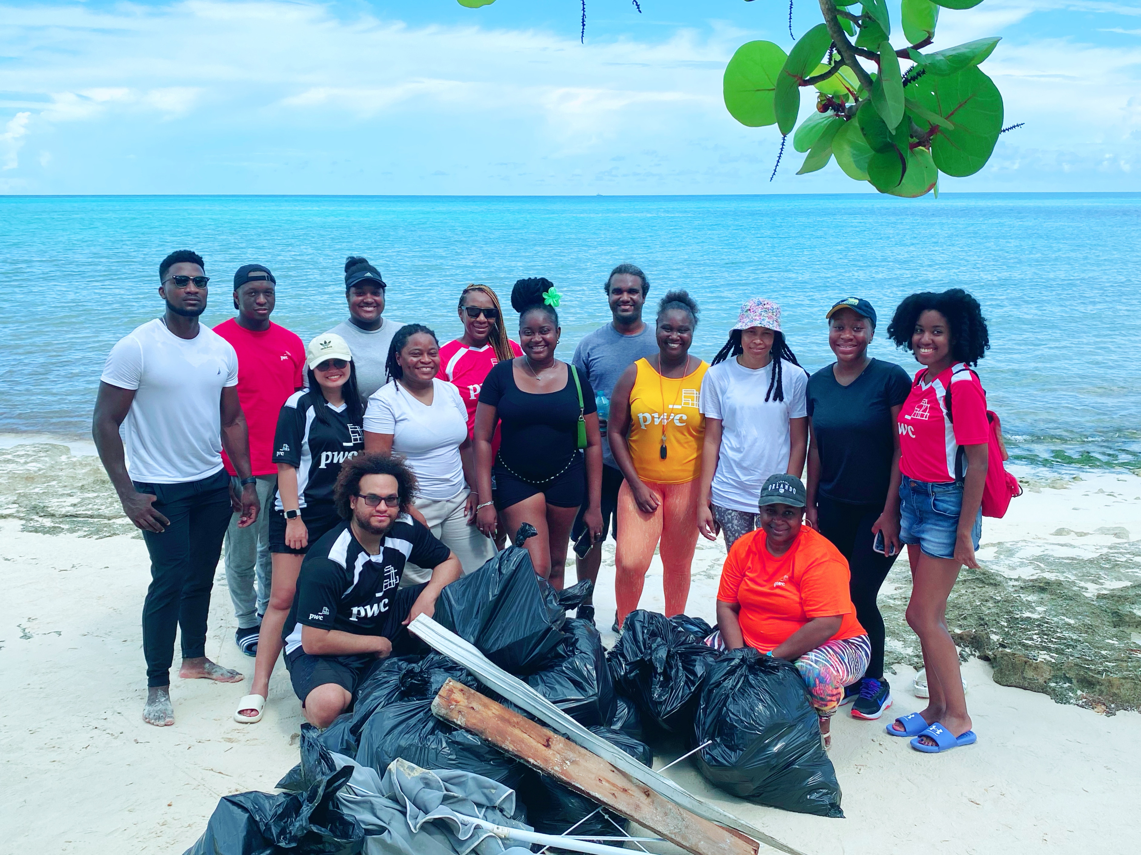 group of volunteers at beach clean up