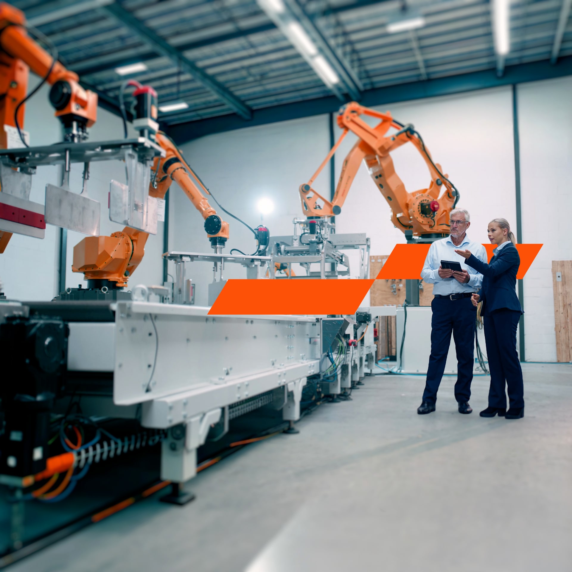 Man and woman standing next to machine