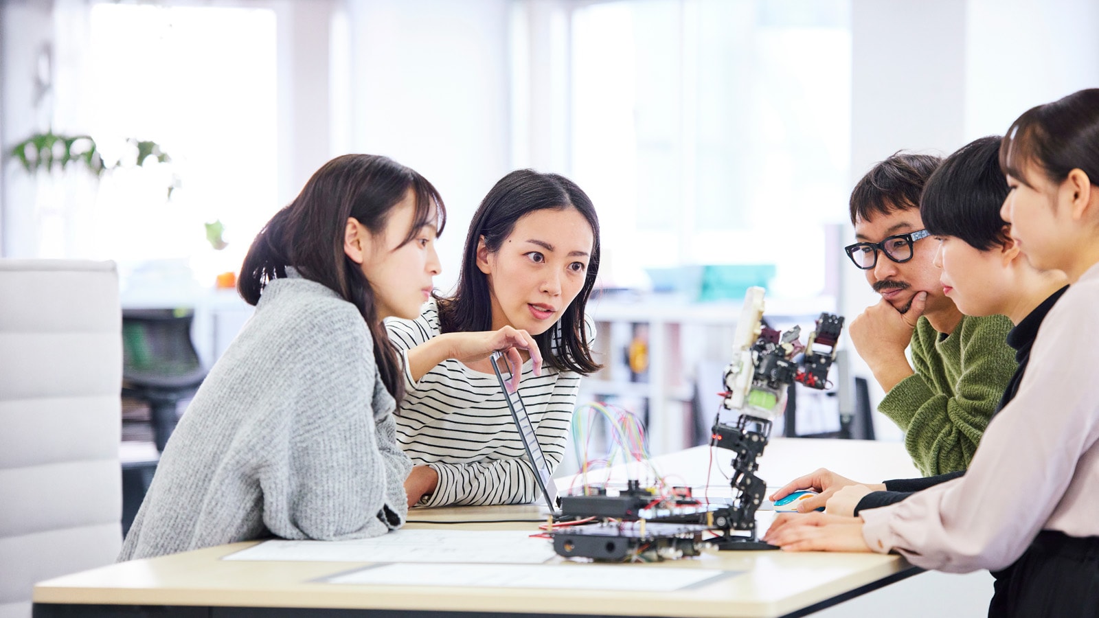 Group collaborating on robotics project