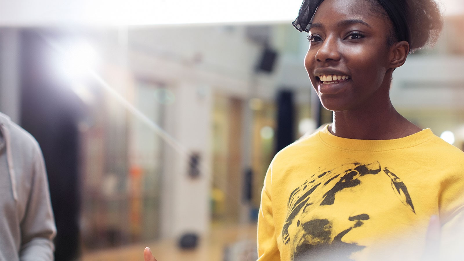 Image of a girl wearing yellow.