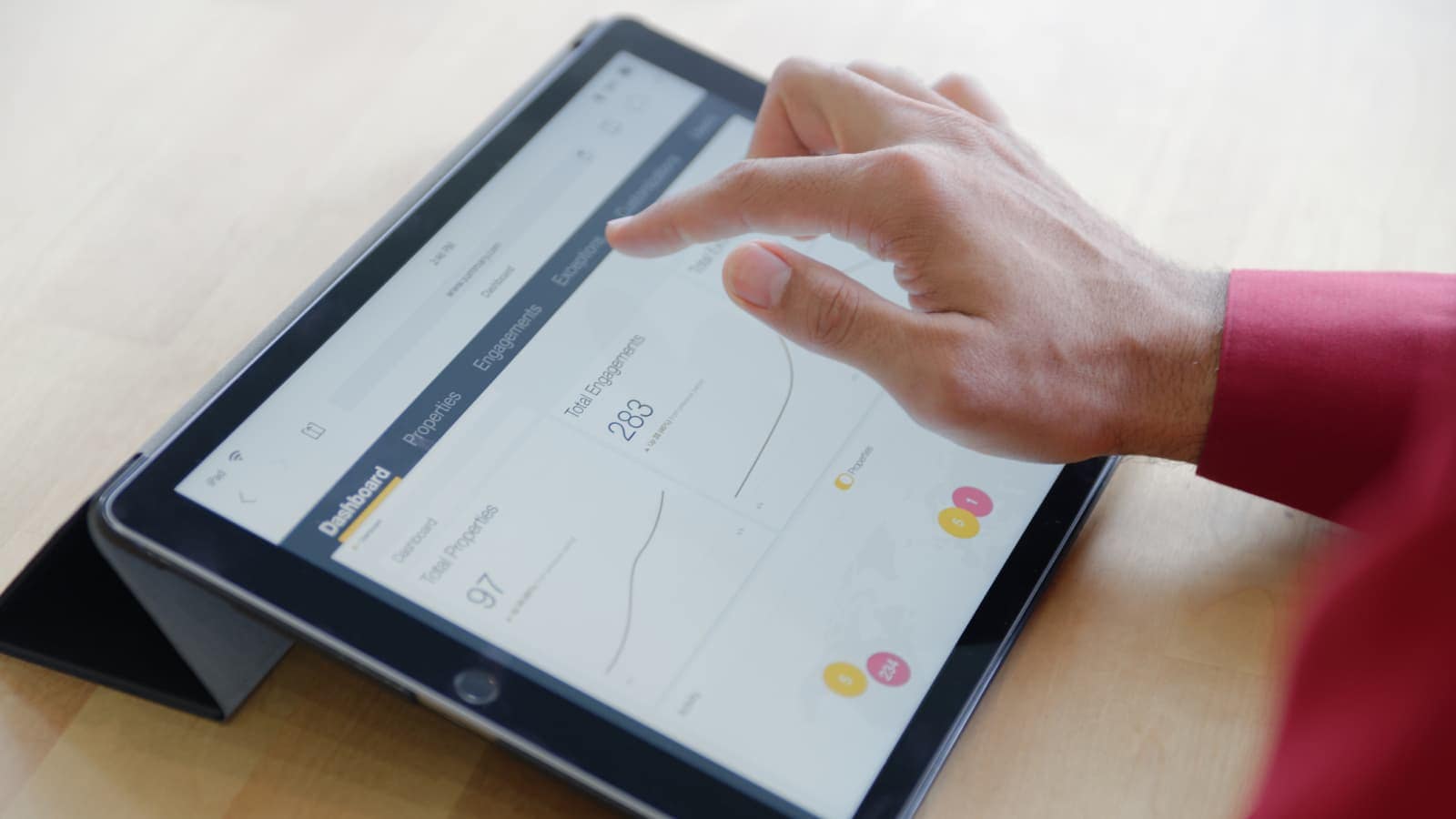 Man using mobile banking application on a tablet