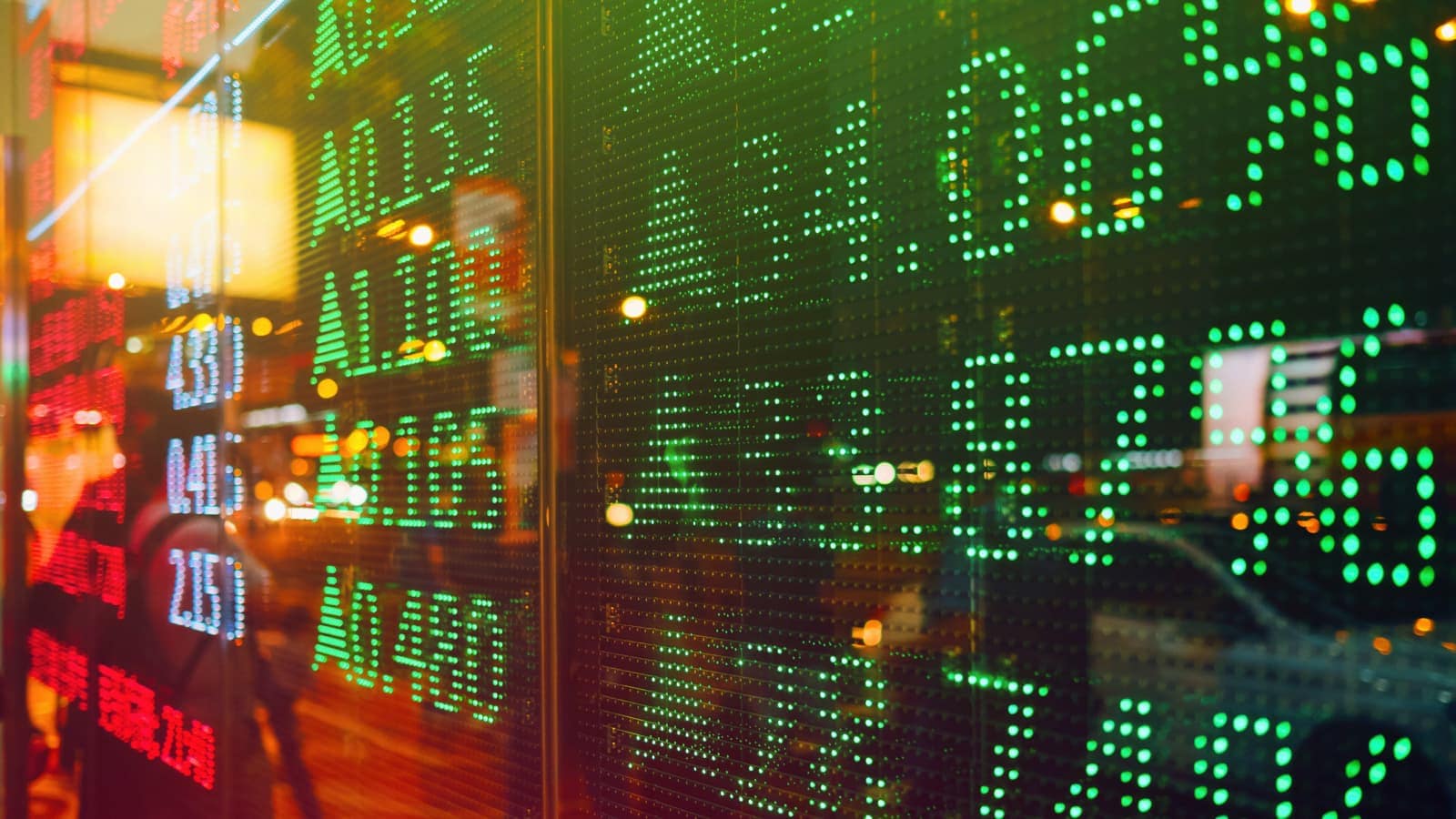 Stock exchange market display screen board on the street showing stock rises