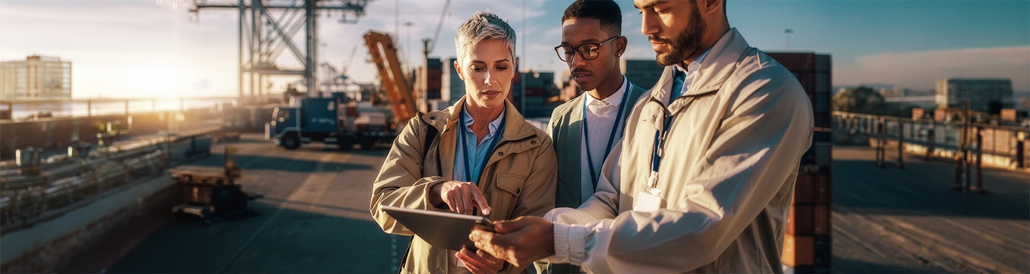 Coworkers looking at a tablet