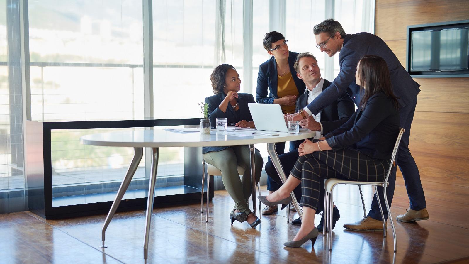 A team discussion at a desk