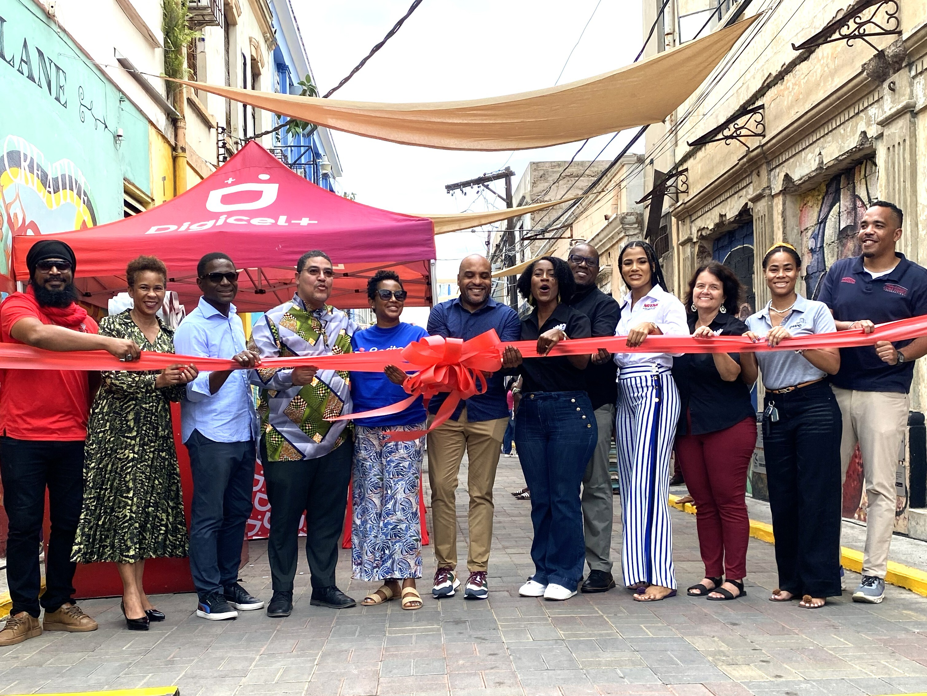 Jamaica cutting the ribbon at activity