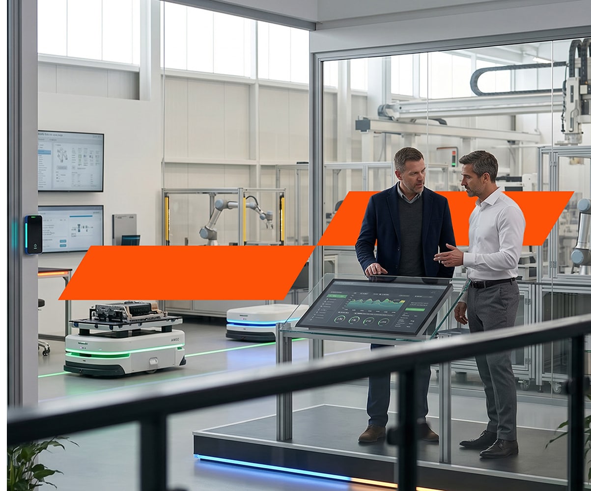 Divi speciālisti laboratorijā sarunājas tehniskajā telpā