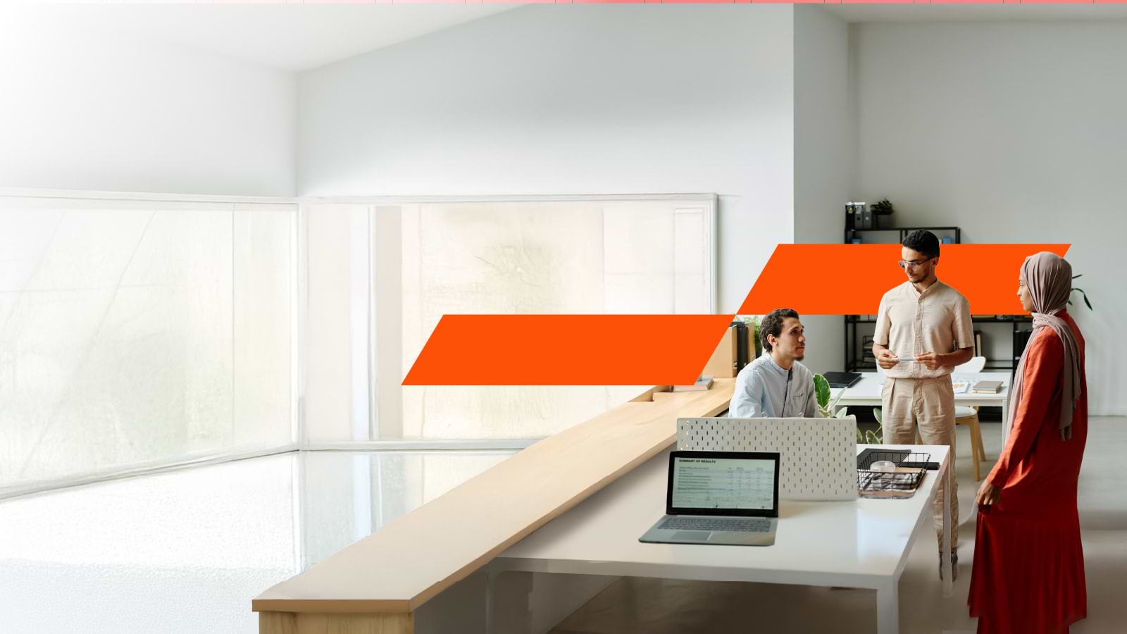 Man and woman looking at laptop