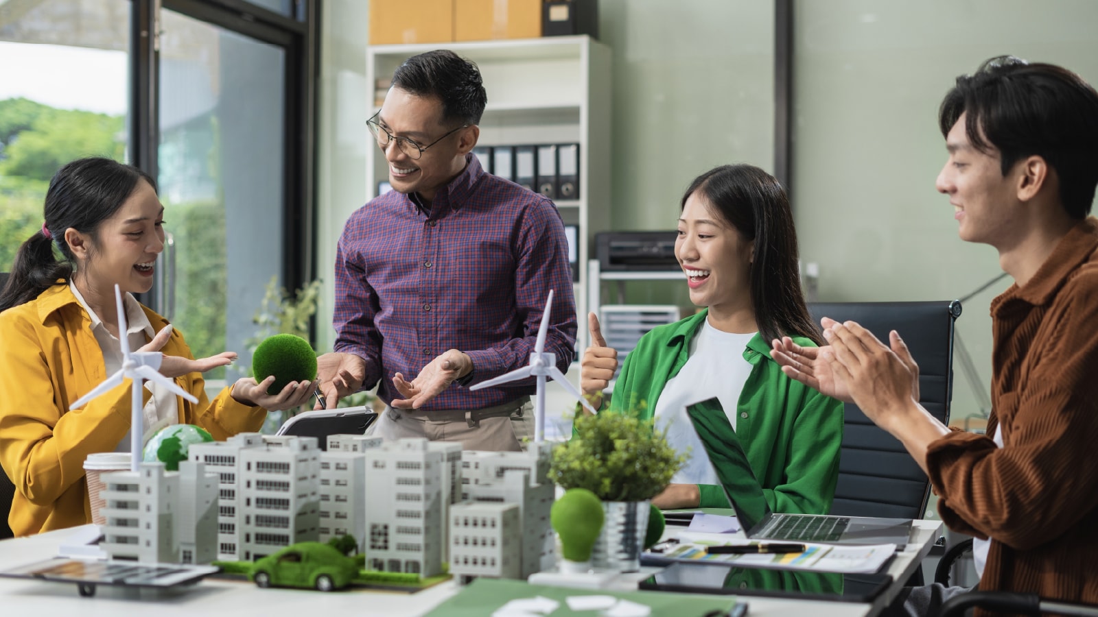 Workers brainstorming sustainability