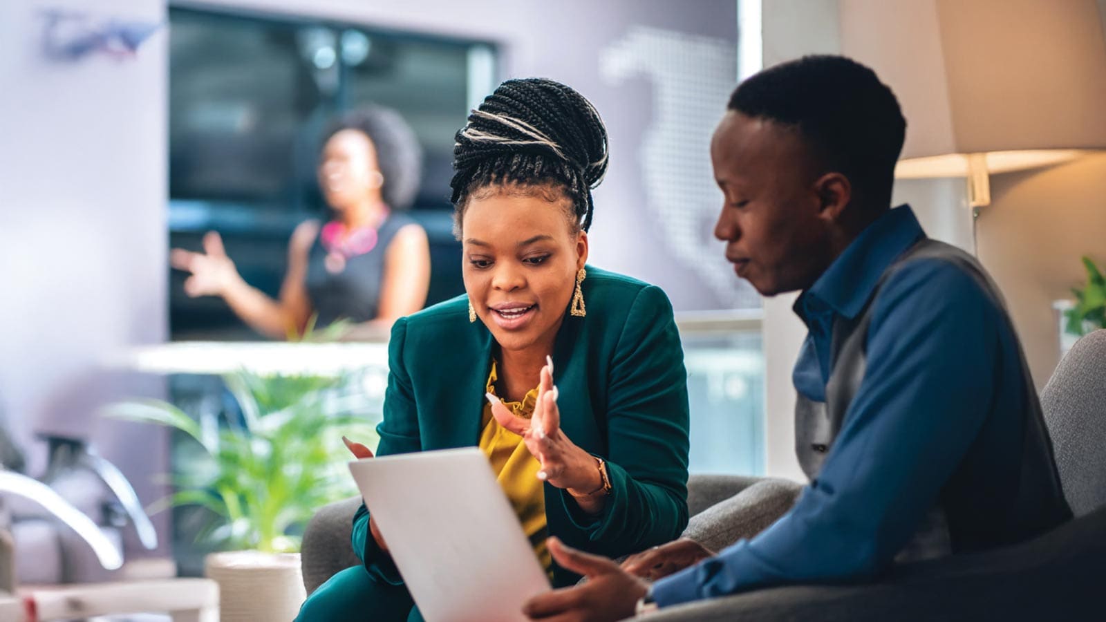 Two people discussing the CEO survey.