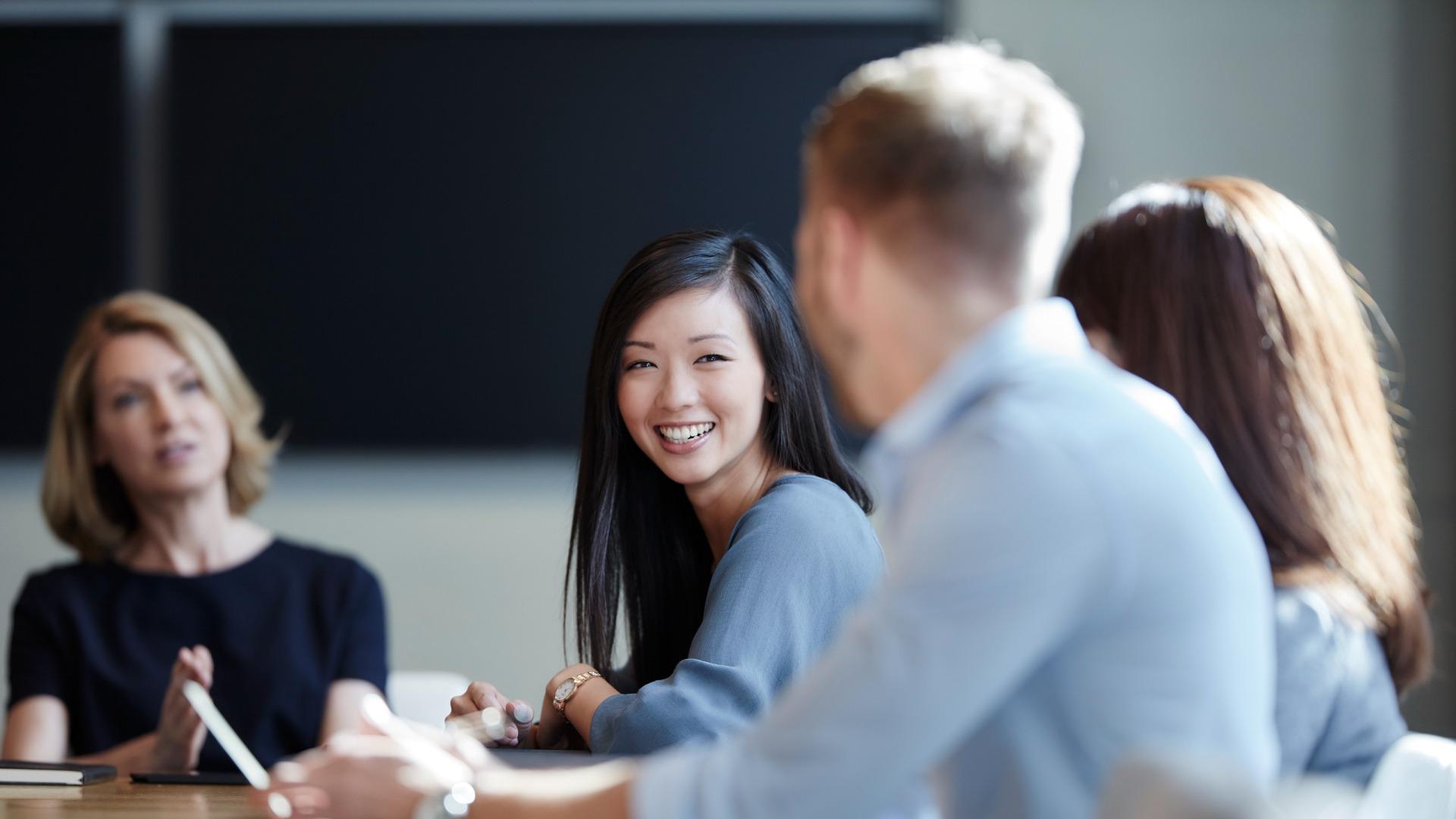 Smiling businesswoman in meeting
