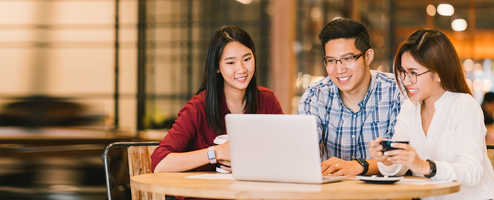 Three colleagues having a meeting