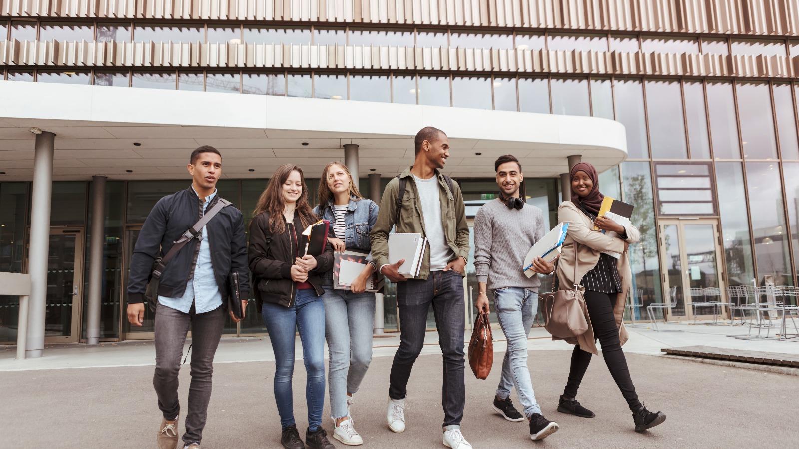 Group of studens discussing business process capabilities.