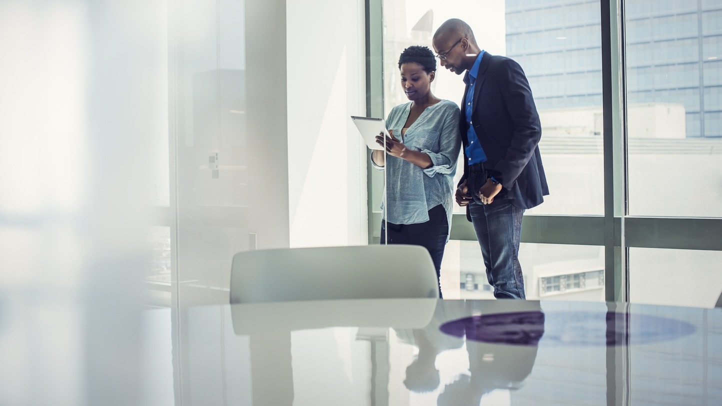 Two colleagues consulting.
