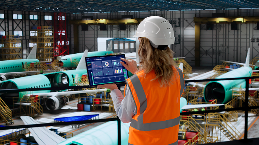 A woman working on a tablet
