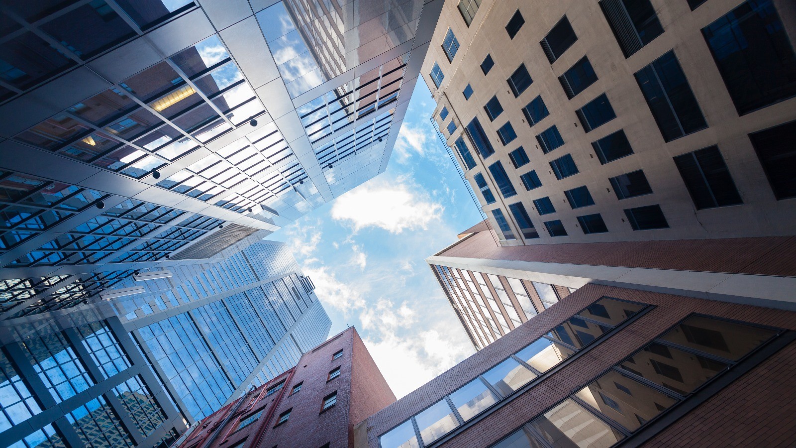 Looking at the sky above office buildings