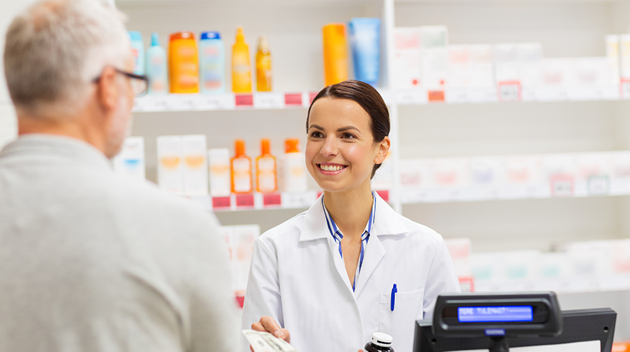 A person speaking to a pharmacist