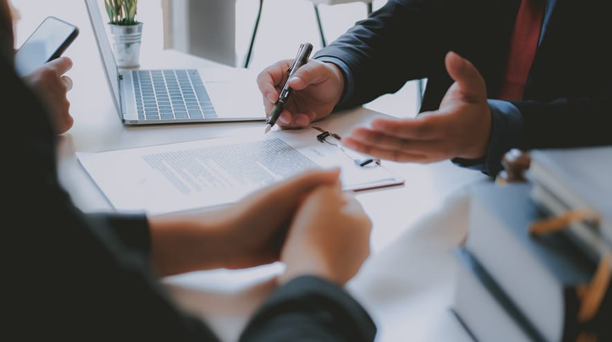 People's hands being expressive at a desk