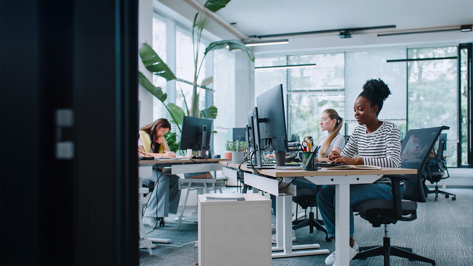 People writing on a board