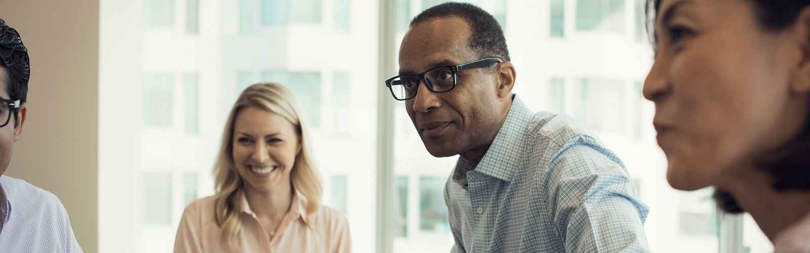 People sitting around a work table